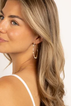 Oorbel witte kralen goud